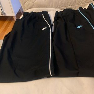 2 pairs of Nike nylon pants